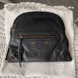 Balenciaga black makeup bag or small clutch bag.